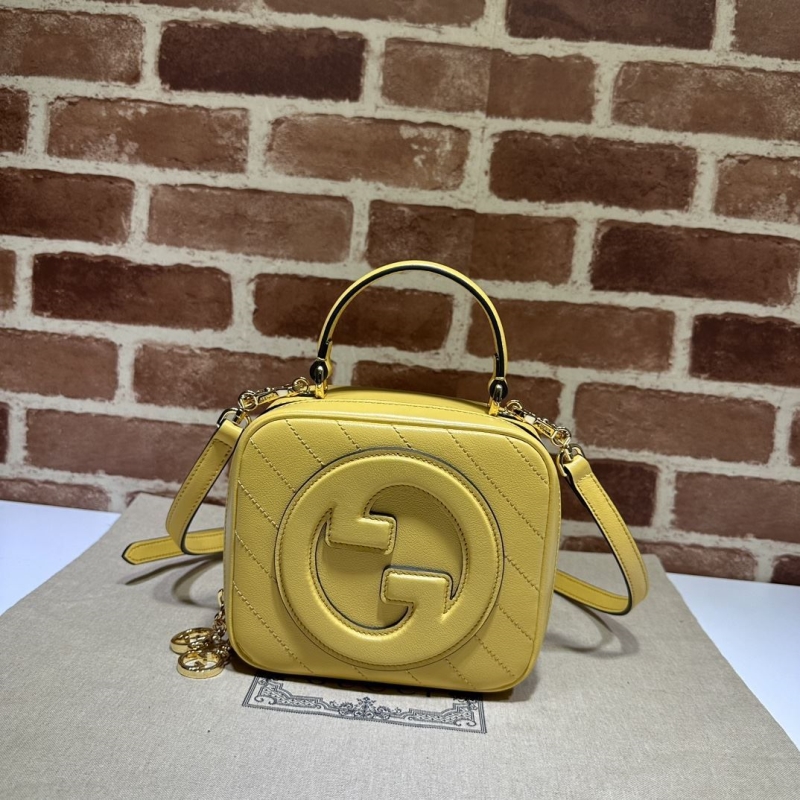 G*u*i top handle bags